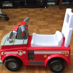 A rideable paw patrol toy car